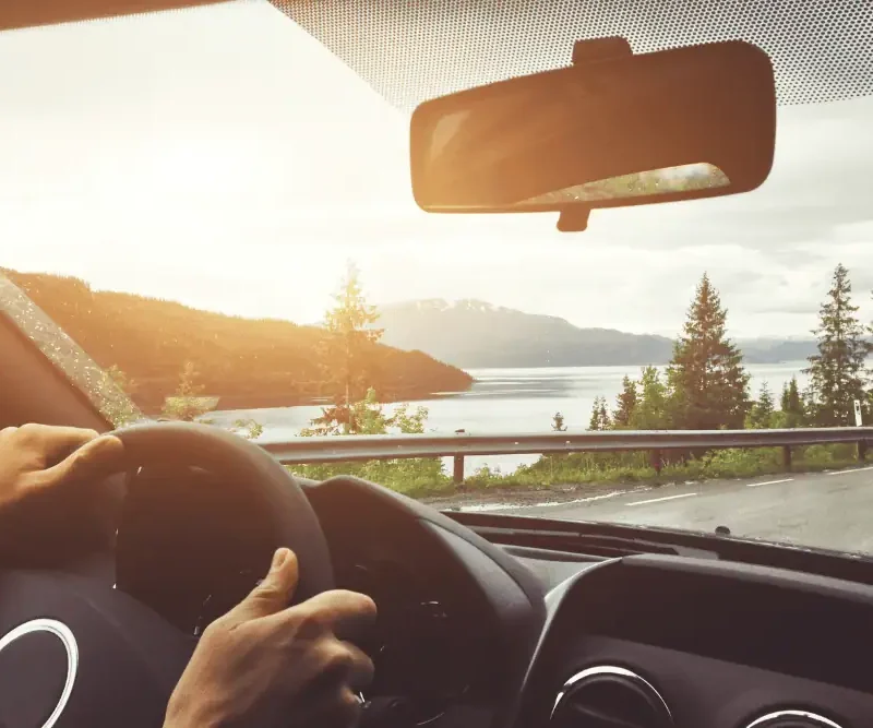 Holiday road trip checklist for LA drivers - family loading car for vacation