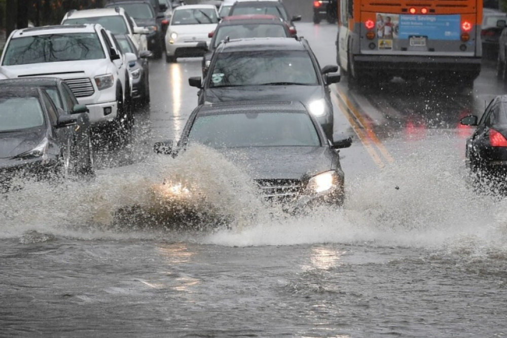 rain ready car safety los angeles with drivers navigating flooded streets in heavy rain